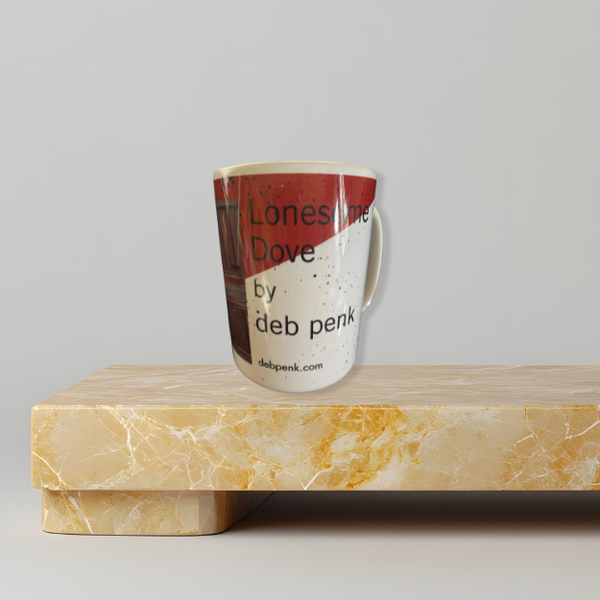 Art-printed ceramic mug showcasing Deb Penk’s Lonesome Dove design